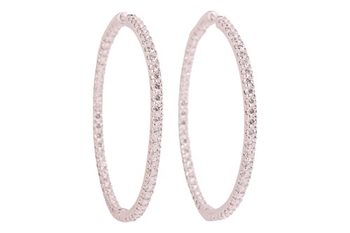 Lot 139 - A pair of diamond-set hoop earrings, with an...