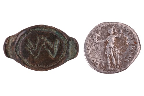 Lot 225 - A Roman coin and a Roman bronze ring; Trajan...