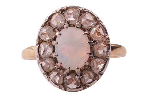 Lot 75 - An opal and diamond cluster ring, centred with...