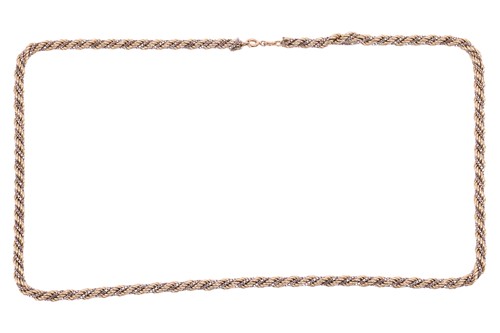 Lot 202 - A twisted rope chain, intertwined with a box...