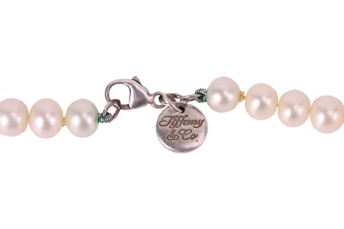 Lot 28 - Tiffany & Co. - A cultured pearl necklace,...
