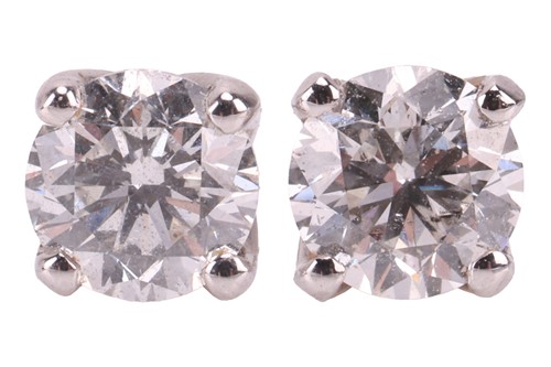Lot 125 - A pair of diamond stud earrings in 18ct white...