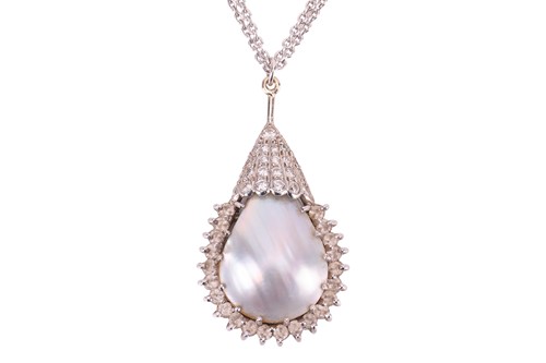 Lot 57 - A mabé pearl pendant, the pear-shaped pendant...