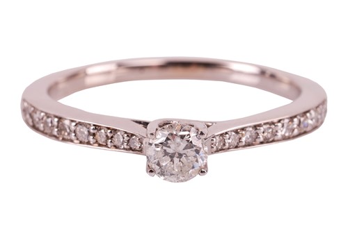 Lot 26 - A diamond ring in 18ct white gold, with an...