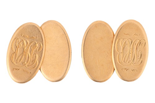 Lot 21 - A pair of oval cufflinks in 18ct yellow gold,...