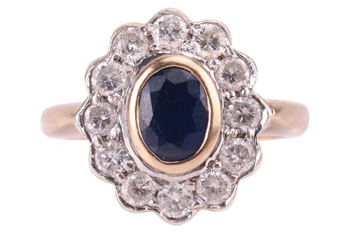 Lot 93 - A sapphire and diamond ring, collet-set with a...