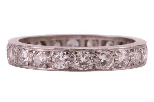 Lot 141 - A diamond eternity ring, pavé-set with twenty...