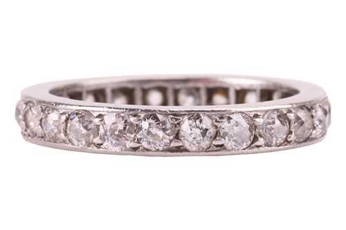 Lot 81 - A diamond eternity ring, set with twenty-five...