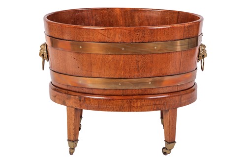 Lot 125 - A George III mahogany oval brass-bound wine...