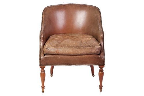 Lot 103 - A George III style mahogany tub armchair,...