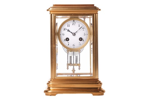 Lot 129 - A French four-glass mantel clock in brass...