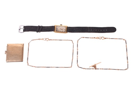 Lot 7 - A 9ct gold vesta case, of engine turned design,...