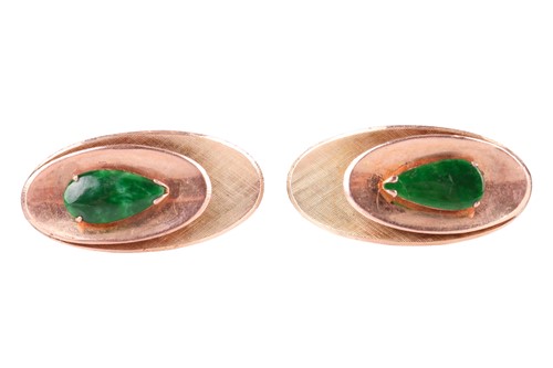 Lot 3 - A pair of jadeite-set cufflinks, the textured...