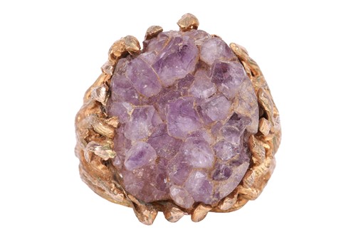 Lot 205 - A Modernist amethyst geode cocktail ring in...
