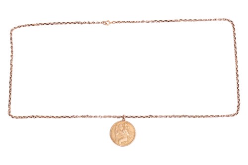 Lot 214 - A 9ct gold St Christopher pendant on a fancy...