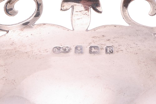 Lot 153 - A collection of bonbon dishes, a silver cream...