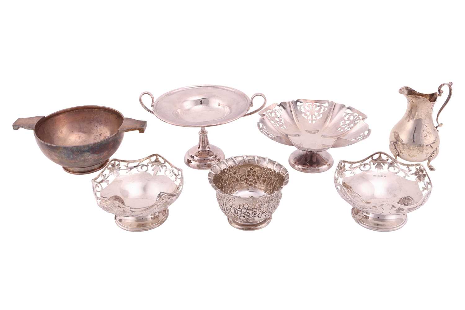 Lot 153 - A collection of bonbon dishes, a silver cream...