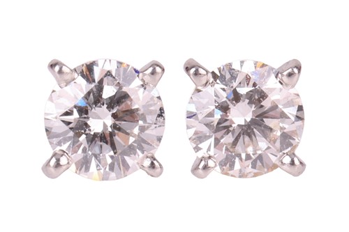 Lot 51 - Cartier – A pair of diamond stud earrings,...