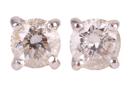 Lot 61 - A pair of diamond stud earrings in 18ct white...