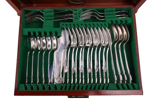 Lot 83 - Two silver-plated canteens in brass-bound oak...