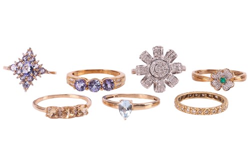 Lot 39 - A collection of seven gem-set rings; to...