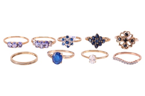 Lot 151 - A collection of nine gem-set rings in 9ct gold;...