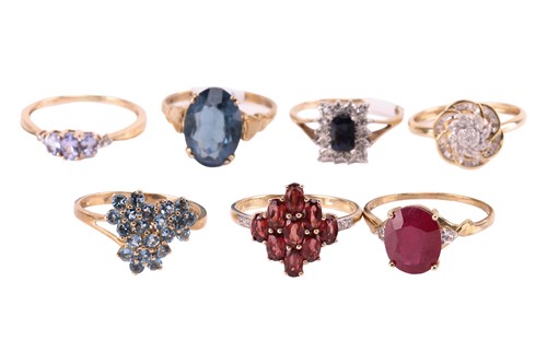 Lot 28 - A selection of seven gem-set rings in 9ct...