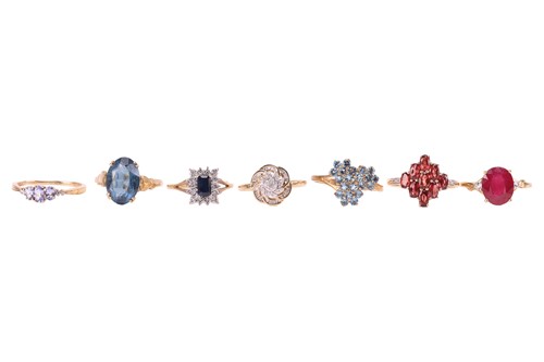 Lot 28 - A selection of seven gem-set rings in 9ct...