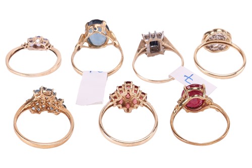 Lot 28 - A selection of seven gem-set rings in 9ct...