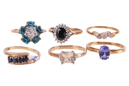 Lot 27 - A group of six gem-set rings in gold;...