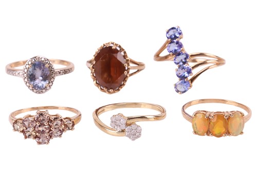 Lot 36 - A group of six gem-set rings in 9ct gold; to...