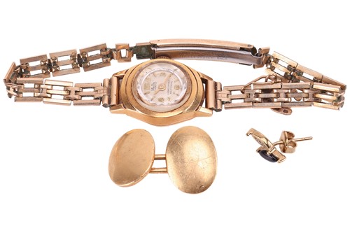 Lot 23 - An 18ct gold lady’s wristwatch with...