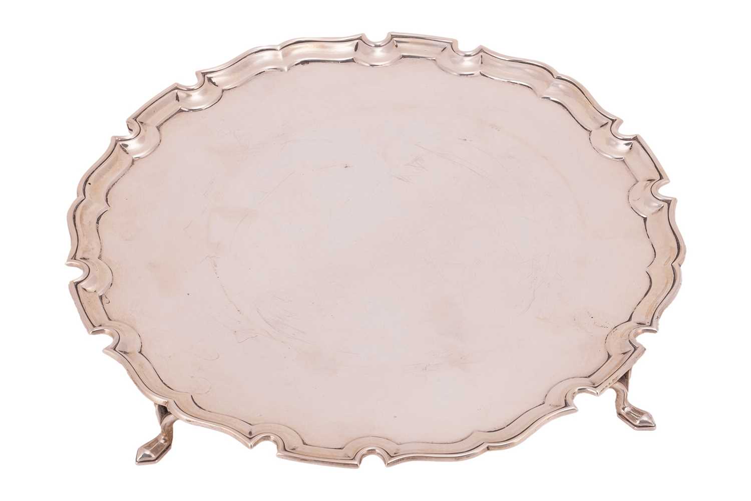 Lot 98 - A silver salver by Edward Barnard & Sons Ltd.,...