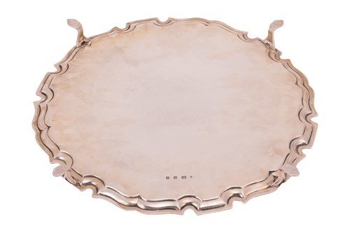 Lot 98 - A silver salver by Edward Barnard & Sons Ltd.,...