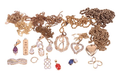 Lot 44 - A group of 9ct and yellow metal pendants and...