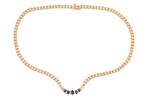 Lot 170 - A sapphire and diamond necklace, the central...
