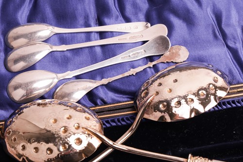 Lot 155 - A cased set of twelve late Victorian silver...