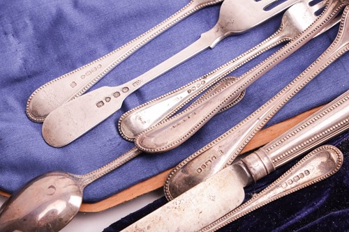Lot 155 - A cased set of twelve late Victorian silver...