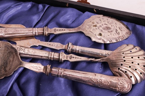 Lot 157 - A collection of silver items and silver-plated...