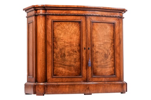 Lot 104 - A Victorian sunburst walnut veneered...