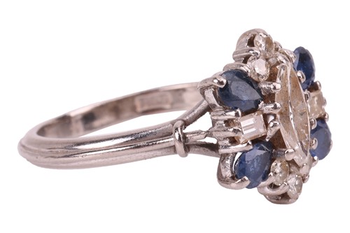 Lot 8 - A diamond and sapphire cluster ring, with an...