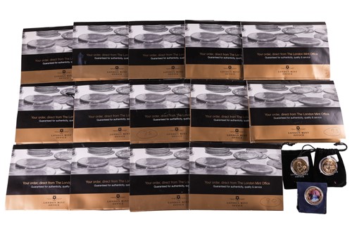 Lot 102 - A large group of commemorative coin sets, to...