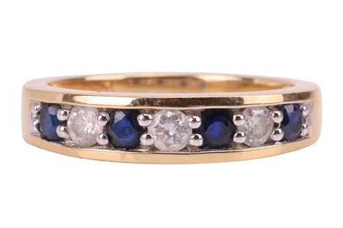 Lot 209 - A sapphire and diamond ring, grain-set with...