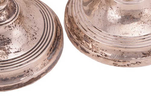Lot 121 - A pair of Victorian silver candlesticks,...