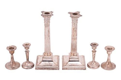 Lot 121 - A pair of Victorian silver candlesticks,...