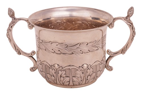 Lot 304 - A silver caudle cup by C J Vander Ltd., London...