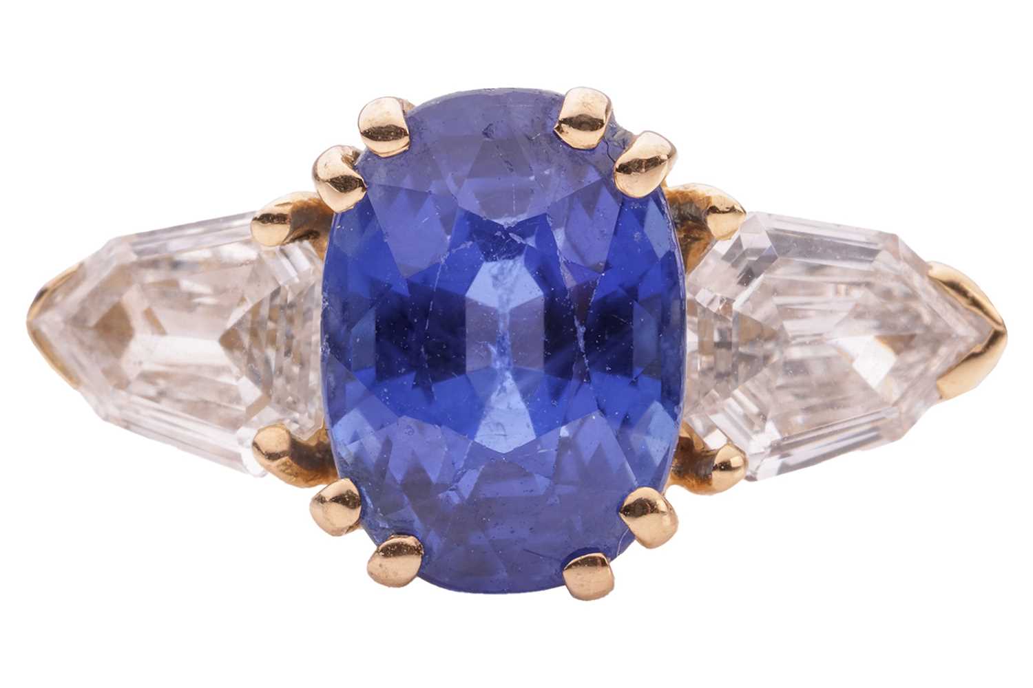 Lot 217 - An unheated Madagascan sapphire and diamond...