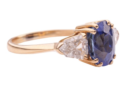 Lot 217 - An unheated Madagascan sapphire and diamond...