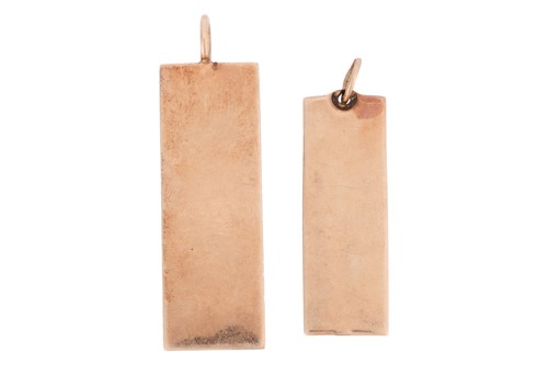Lot 118 - Two 9ct gold ingot pendants; the first...