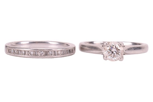 Lot 67 - A set of platinum and diamond rings; the...